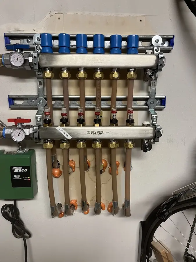 Plumber performing Water Heater Repair at a residential property in Edmonds